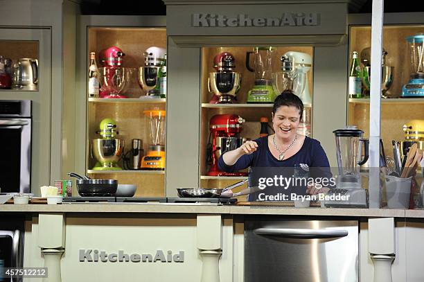 Chef Alex Guarnaschelli conducts a culinary presentation at the Grand Tasting presented by ShopRite featuring KitchenAid® culinary demonstrations...