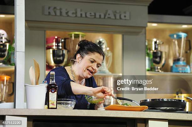 Chef Alex Guarnaschelli conducts a culinary presentation at the Grand Tasting presented by ShopRite featuring KitchenAid® culinary demonstrations...