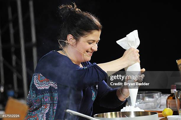 Chef Alex Guarnaschelli conducts a culinary presentation at the Grand Tasting presented by ShopRite featuring KitchenAid® culinary demonstrations...