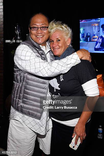 Chefs Masaharu Morimoto and Anne Burrell pose backstage at the Grand Tasting presented by ShopRite featuring KitchenAid® culinary demonstrations...
