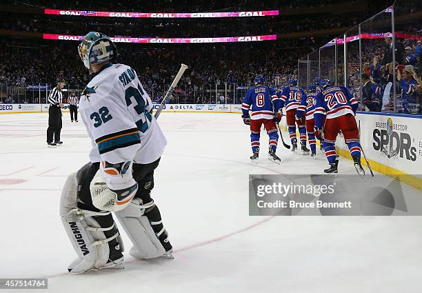 The New York Rangers celebrate a goal by Rick Nash at 19:20 of the second period against Alex Stalock of the San Jose Sharks at Madison Square Garden...