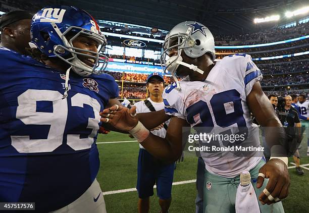 Mike Patterson of the New York Giants talks with DeMarco Murray of the Dallas Cowboys after a 31-21 win against the New York Giants at AT&T Stadium...