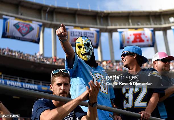 San Diego Chargers fans cheer for their team during the NFL football game against Kansas City Chiefs at Qualcomm Stadium on October 19 in San Diego,...