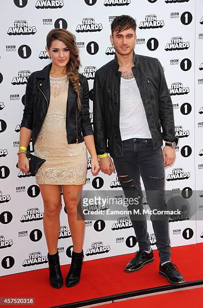 Anna Passey and Charlie Clapham attend the Radio One Teen Awards at Wembley Arena on October 19, 2014 in London, England.