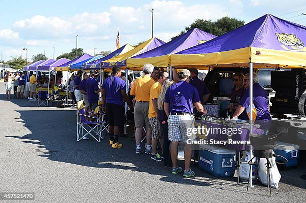 Fans of the LSU Tigers tailgate prior to a game against the Kentucky Wildcats at Tiger Stadium on October 18, 2014 in Baton Rouge, Louisiana. LSU won...