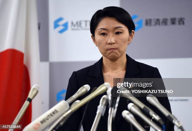 Japanese Economy, Trade and Industry Minister Yuko Obuchi announces her resignation of her post at a press conference at her office in Tokyo on...