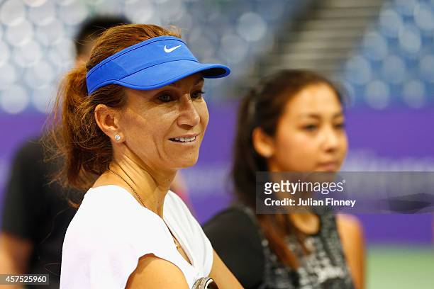 Ex player Iva Majoli and Rising Star Zarina Diyas of Kazakhstan arrive for the Sponsor pro am during day one of the BNP Paribas WTA Finals tennis at...