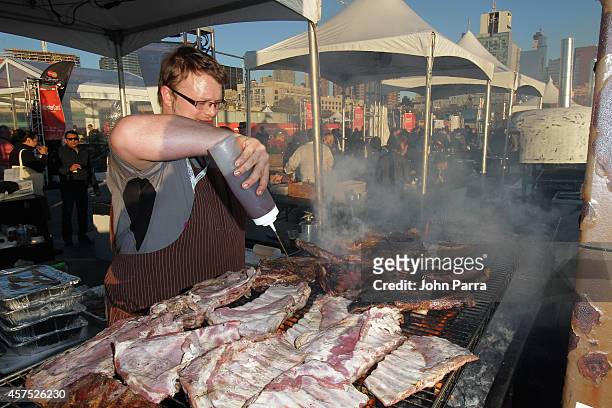 Chef Timothy Rattray prepares food at Meatopia X: The Carnivore's Ball Presented By Creekstone Farms Hosted By Michael Symon during Food Network New...