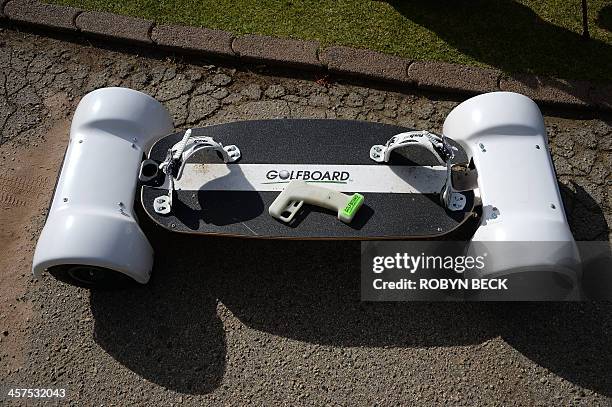 GolfBoard and it's handheld Bluetooth control are seen at the Malibu Golf Club in Malibu, California December 9, 2013. The innovative device aims to...