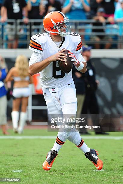 Brian Hoyer of the Cleveland Browns drops back to pass against the Jacksonville Jaguars at EverBank Field on October 19, 2014 in Jacksonville,...