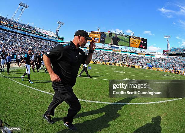 Head Coach Gus Bradley of the Jacksonville Jaguars heads to midfield after the game against the Cleveland Browns at EverBank Field on October 19,...