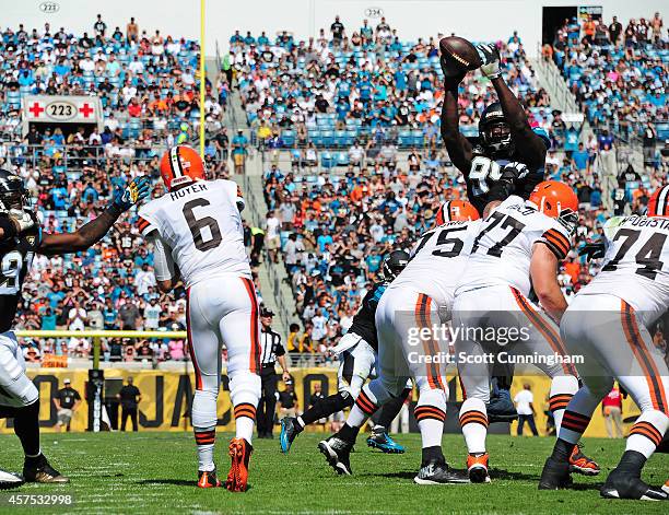 Sen'Derrick Marks of the Jacksonville Jaguars bats down a pass by Brian Hoyer of the Cleveland Browns at EverBank Field on October 19, 2014 in...