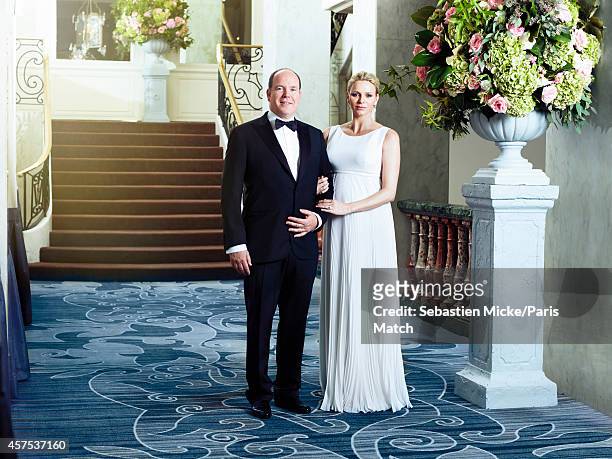 Prince Albert of Monaco and his wife Charlene who is six months pregnant are photographed for Paris Match during an evening gala for the Foundation...