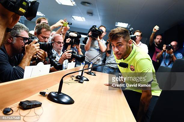 Neymar of FC Barcelona arrives for a press conference ahead of their UEFA Champions League Group F match against AFC Ajax at Ciutat Esportiva on...
