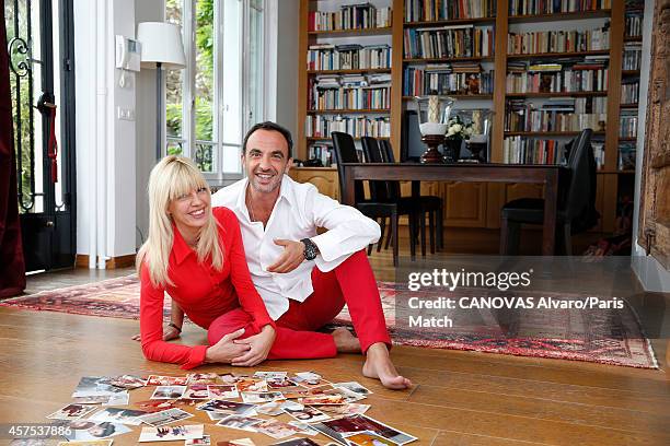 Tv presenter Nikos Aliagas and his wife Tina Grigoriou are photographed for Paris Match on October 10, 2014 in Paris, France.