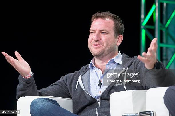 Eze Vidra, general partner at Google Ventures Europe, gestures whilst speaking during a panel session at the Disrupt Europe 2014 conference in...