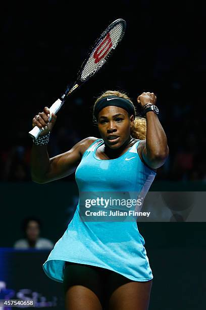 Serena Williams of USA celebrates winning her match against Ana Ivanovic of Serbia dduring day one of the BNP Paribas WTA Finals tennis at the...