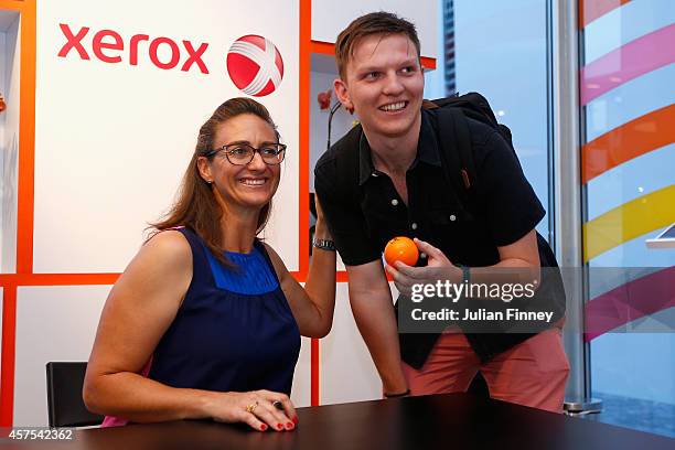 Ex player Mary Pierce visits the Xerox fans booth during day one of the BNP Paribas WTA Finals tennis at the Singapore Sports Hub on October 20, 2014...