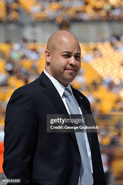 Omar Khan, Director of Football and Business Administration of the Pittsburgh Steelers, looks on from the sideline before a game against the...