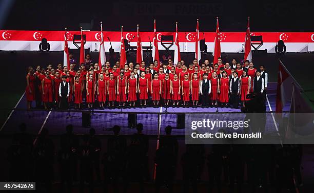 Local choir sing at the opening ceremony prior to the start of the opening round robin match of the BNP Paribas WTA Finals at Singapore Sports Hub on...