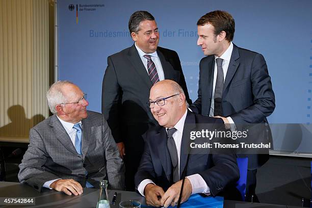 German Finance Minister Wolfgang Schaeuble, German Economy Minister and Vice Chancellor Sigmar Gabriel, French Finance Minister Michel Sapin, and...