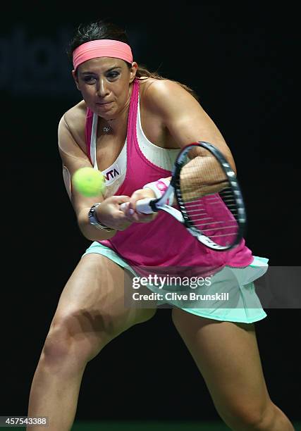 Marion Bartoli of France in action on her way to victory against Tracy Austin of the United States and Iva Majoli of Croatia in the WTA Legends...