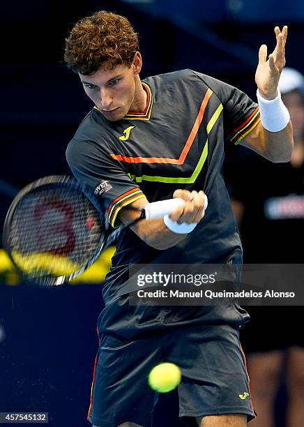 Pablo Carreno Busta of Spain in action against Marcel Granollers of Spain during day one of the ATP 500 World Tour Valencia Open tennis tournament at...