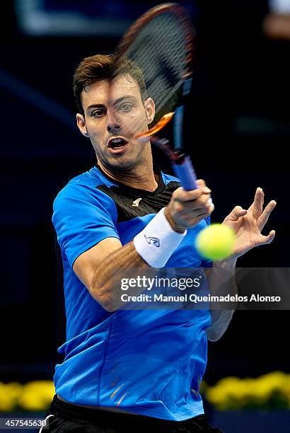 Marcel Granollers of Spain in action against Pablo Carreno Busta of Spain during day one of the ATP 500 World Tour Valencia Open tennis tournament at...