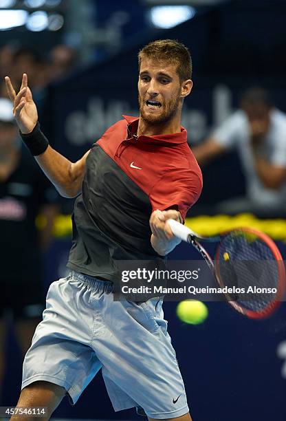 Martin Klizan of Slovakia in action against Stefan Kozlov of the United States during day one of the ATP 500 World Tour Valencia Open tennis...