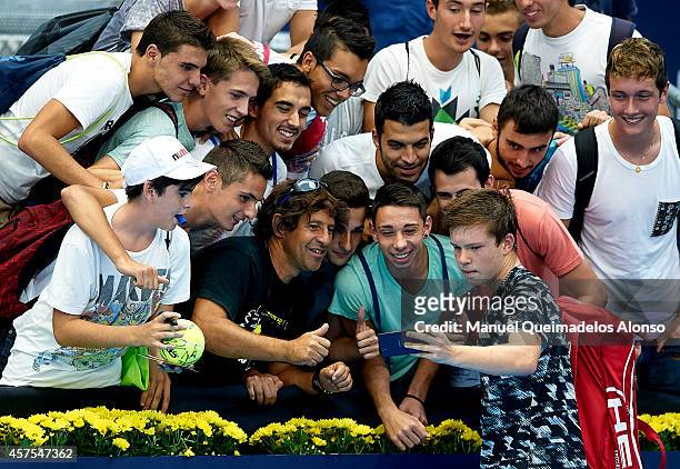 Stefan Kozlov of the United States takes a selfie with the fans after his match against Martin Klizan of Slovakia during day one of the ATP 500 World...