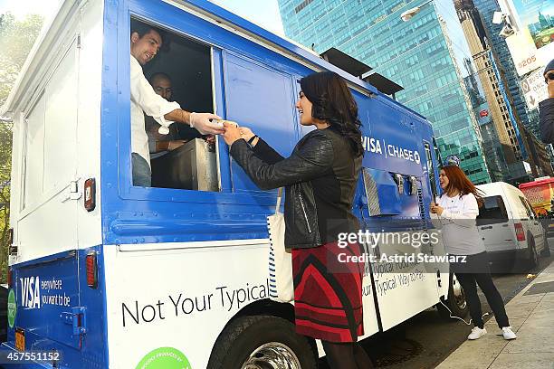 Visa and Chase celebrate the launch of Apple Pay with free doughnuts for all New Yorkers from Dough on October 20, 2014 in New York City.
