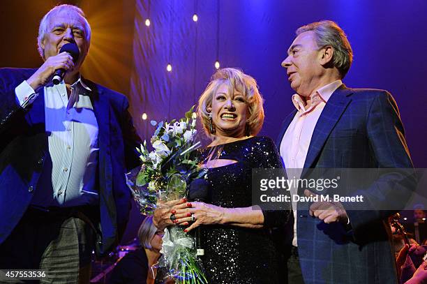 Sir Tim Rice and Lord Andrew Lloyd Webber present Elaine Paige with flowers following her performance of "Memory" from "Cats" at her 50th Anniversary...