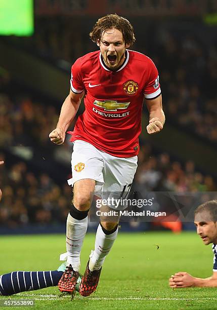 Daley Blind of Manchester United celebrates scoring their second and equalising goal during the Barclays Premier League match between West Bromwich...