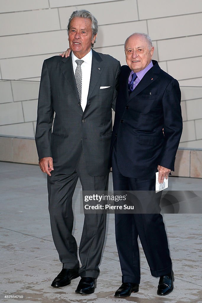 Alain Delon and Pierre Berge attend the Foundation Louis Vuitton