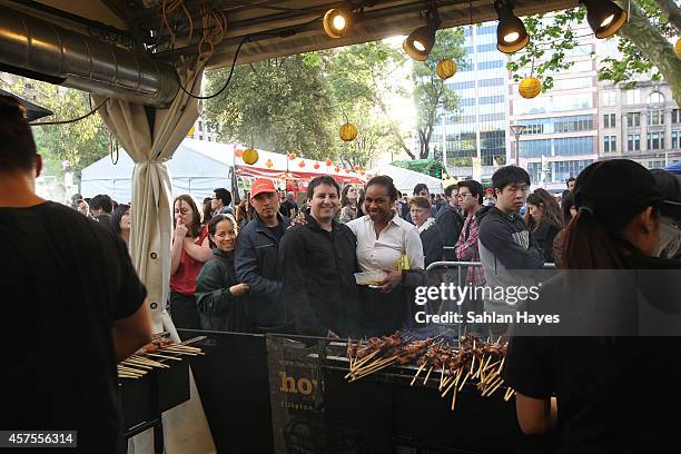 Chefs prepare food at the Sydney Night Noodle Markets at Hyde Park on October 17, 2014 in Sydney, Australia. The markets run from 10-26 October as...
