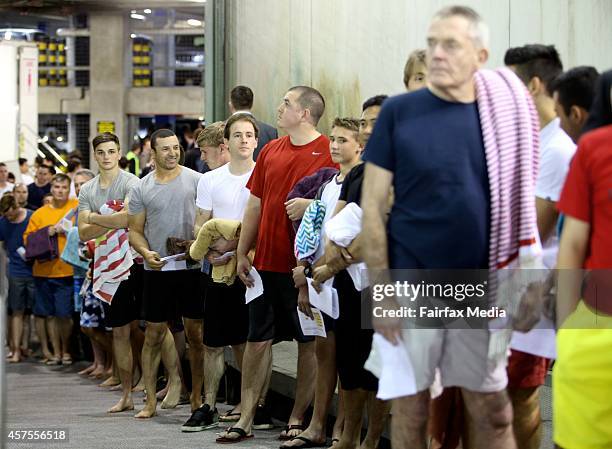 Mass baptism is held at the International Convention of Jehovahs Witnesses at Etihad Stadium in Melbourne, October 18, 2014. The event attracted...