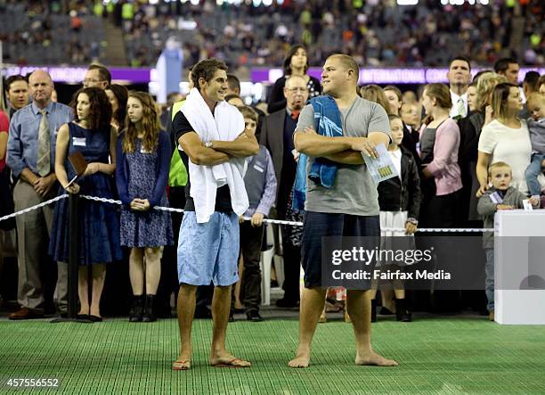 Followers participate in the mass baptism at the International Convention of Jehovahs Witnesses at Etihad Stadium in Melbourne, October 18, 2014. The...