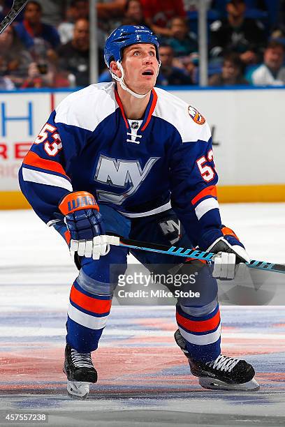 Casey Cizikas of the New York Islanders skates against the San Jose Sharks at Nassau Veterans Memorial Coliseum on October 16, 2014 in Uniondale, New...