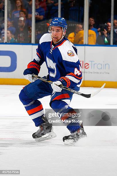 Calvin de Haan of the New York Islanders skates against the San Jose Sharks at Nassau Veterans Memorial Coliseum on October 16, 2014 in Uniondale,...