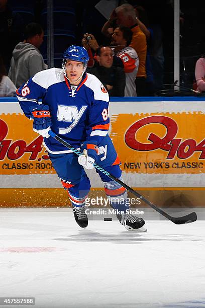 Nikolai Kulemin of the New York Islanders skates during warm-ups prior to their game against the San Jose Sharks at Nassau Veterans Memorial Coliseum...
