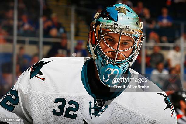 Alex Stalock of the San Jose Sharks skates against the New York Islanders at Nassau Veterans Memorial Coliseum on October 16, 2014 in Uniondale, New...