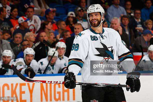 Brent Burns of the San Jose Sharks skates against the New York Islanders at Nassau Veterans Memorial Coliseum on October 16, 2014 in Uniondale, New...