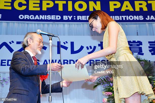 Angelica Michibata wins award during 27th Japan Best Dressed Eye Award on October 20, 2014 in Tokyo, Japan.