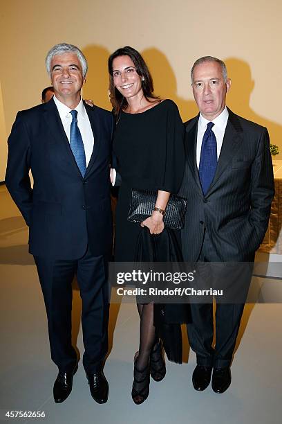 Tonio Belloni, Francesco Trapani and his wife Lorenza attend the Foundation Louis Vuitton Opening at Foundation Louis Vuitton on October 20, 2014 in...