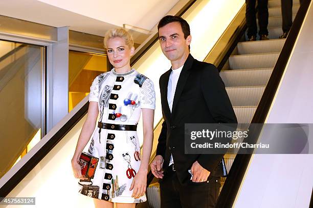 Nicolas Ghesquiere and Michelle Williams attend the Foundation Louis Vuitton Opening at Foundation Louis Vuitton on October 20, 2014 in...