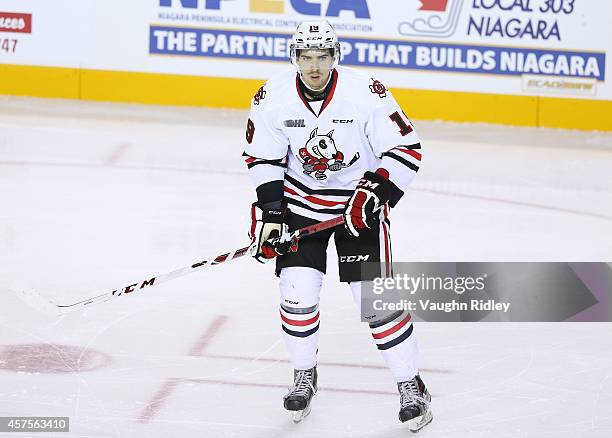 Cody Payne of the Niagara Ice Dogs skates during an OHL game between the Sudbury Wolves and the Niagara Ice Dogs at the Meridian Centre on October...