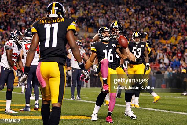 Lance Moore of the Pittsburgh Steelers celebrates after catching a touchdown passed by Antonio Brown in the second quarter against the Houston Texans...