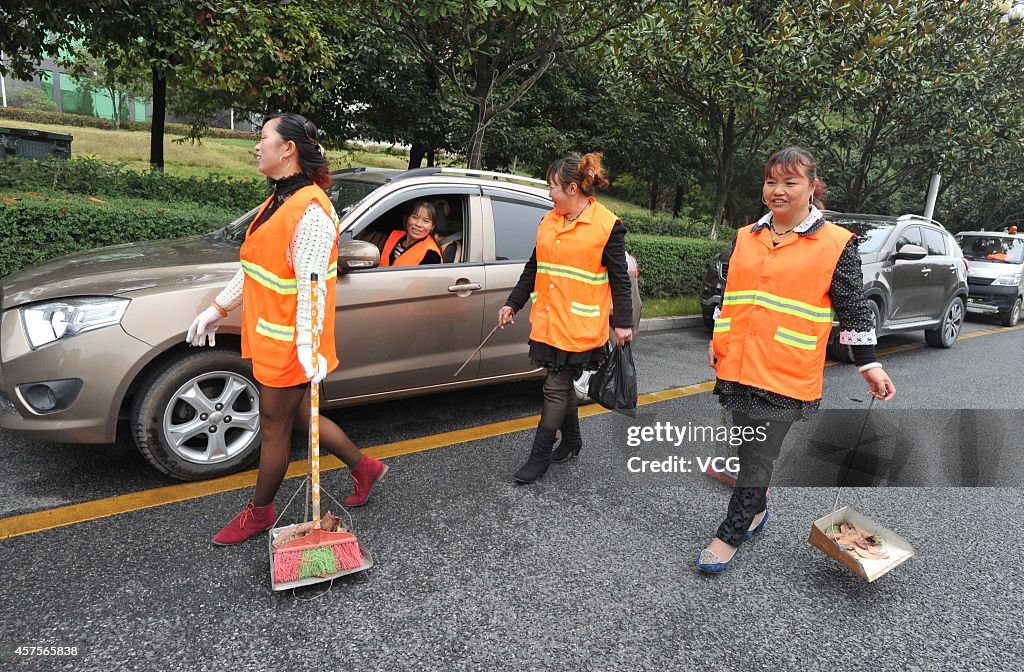 Sanitation Worker Do Cleaning By Car In Guiyang
