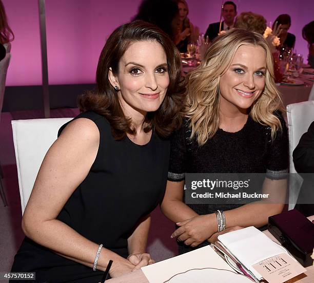 Actresses Tina Fey and Amy Poehler attend ELLE's 21st Annual Women in Hollywood Celebration at the Four Seasons Hotel on October 20, 2014 in Beverly...