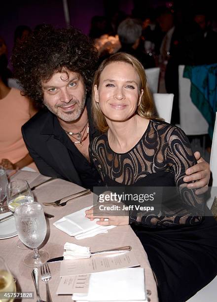 Recording artist Doyle Bramhall II and actress Renee Zellweger attend ELLE's 21st Annual Women in Hollywood Celebration at the Four Seasons Hotel on...